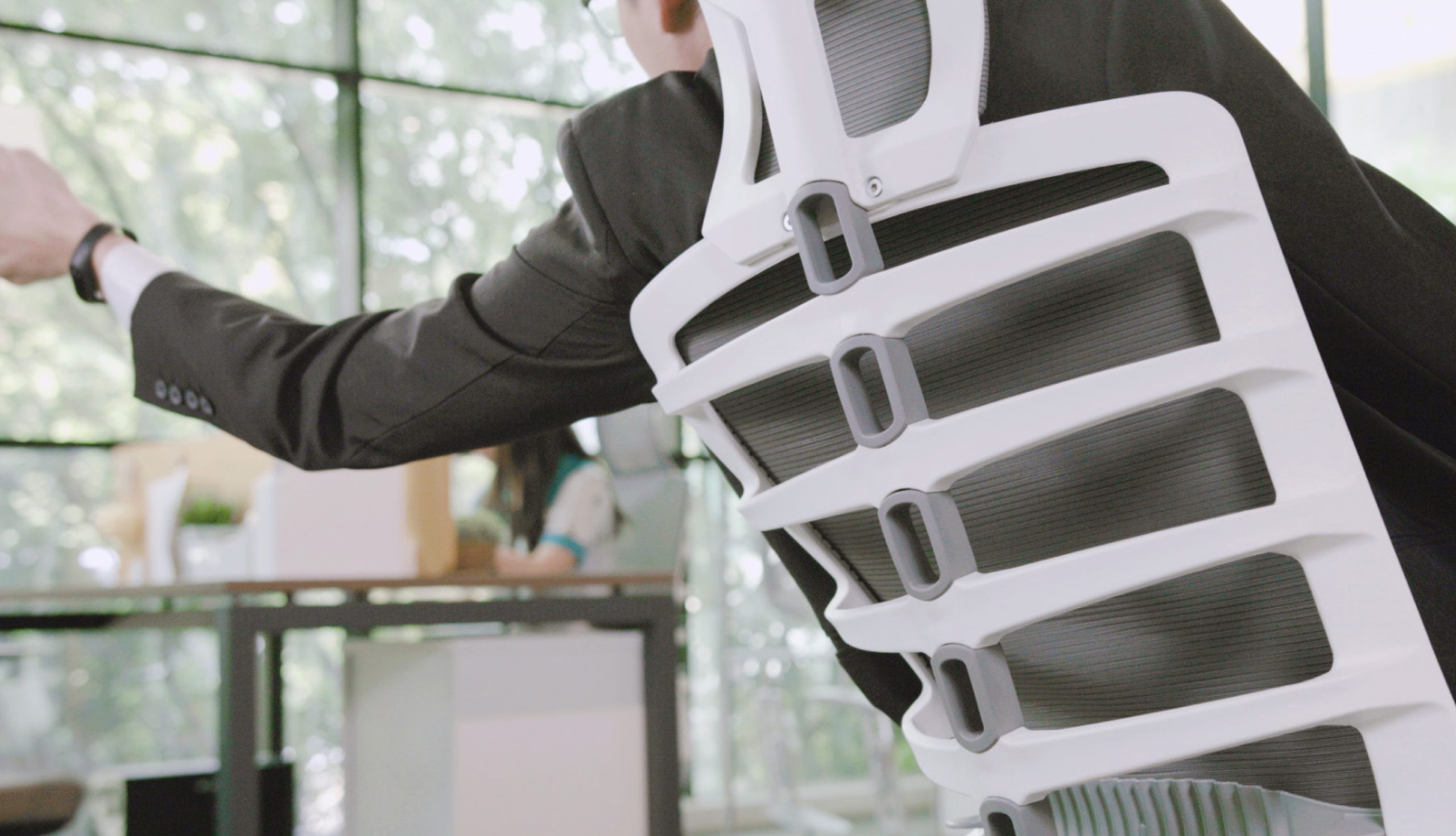 Ergonomic chair with anatomically shaped lumbar support designed for the natural curve of the spine